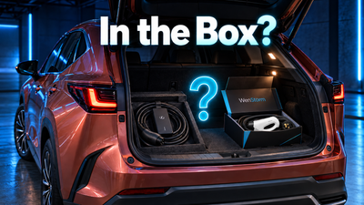 2026 Lexus NX 450h+ PHEV plugged into a residential 240-volt outlet with its OEM dual-voltage charging cable
