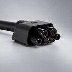 Close-up of the WenStorm adapter connector designed for compatibility with both Tesla Gen 2 and Gen 3 Mobile Connectors.